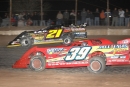 Billy Moyer (21) fends off a challenge from Tim McCreadie (39) in winning the fourth round of USA Raceway's Wild West Shootout. (photofinishphotos.com)