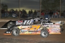 Winner Morgan Bagley (14m) and polesitter Billy Moyer Jr. (21jr) battle for the lead early in Sunday's Bill Cheesbourg Memorial. (photofinishphotos.com)