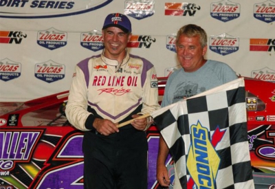 Promoter Johnny Stokes joins Billy Moyer in victory lane. (rickschwalliephotos.com)