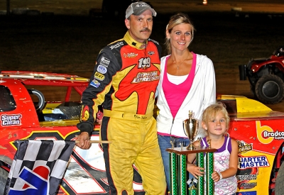 Wife Lori and daughter Ainsley join Tim Fuller at Sharon. (jmsprophoto.com)