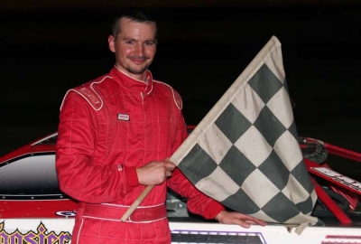 Casey Noonan picks up $2,000 and the checkers. (Steve Datema)