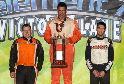 Steve Drake stands tall on the USA Raceway podium. (thesportswire.net)