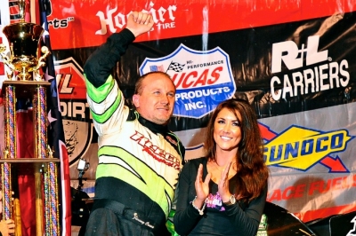 Jimmy Owens waves after his third North-South 100 victory. (thesportswire.net)