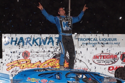 Josh Richards celebrates atop his car at Winston Speedway. (Deephouse Photos)
