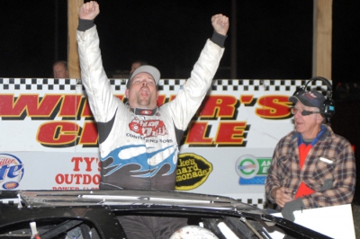 John Anderson celebrates his $3,000 victory Saturday in Greenwood, Neb. (Andrew Towne)