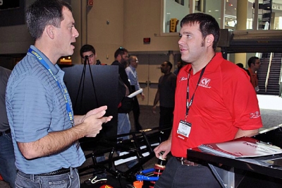 Matt Miller (left) talks with Kevin Rumley (right) of CV Products. (DirtonDirt.com)