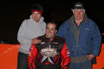 Jesse Stovall with car owners Lori and Al Humphrey (erikgrigsbyphotos.com)
