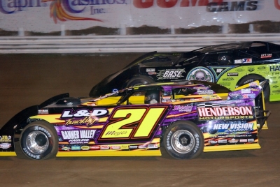 Billy Moyer (21) and Scott Bloomquist (0) started up front in the first heat. (DirtonDirt.com)