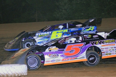 Robbie Stuart (6R) outran Jon Mitchell (5) for a June 15 victory at I-30 Speedway. (Best Photography)