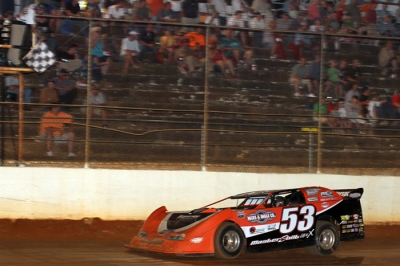 Ray Cook takes the checkers at 411 Motor Speedway. (Chad Wells)