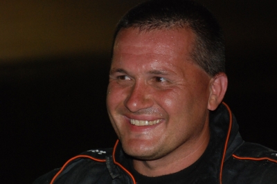 Eddie Carrier Jr. had a big smile in victory lane at Brushcreek. (DirtonDirt.com)