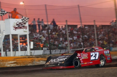 Jake Redetzke takes the checkers at Casino Speedway. (crpphotos.com)