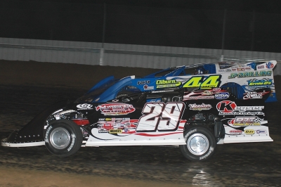 Darrell Lanigan (29) and Clint Smith (44) battle tightly in the late stages. (actiontrackphotos.com)