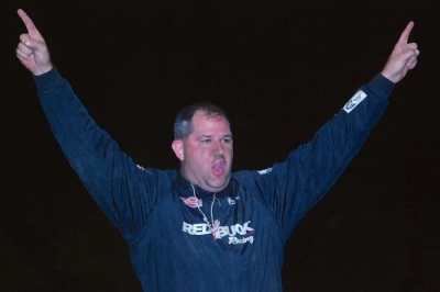 Dustin Neat climbed atop his car to celebrate his $7,500 victory. (DirtonDirt.com)