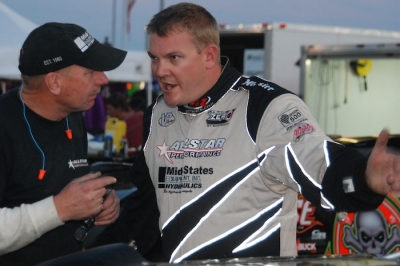 Brady Smith (right) talks things over with a crew member before Thursday's time trials. (DirtonDirt.com)