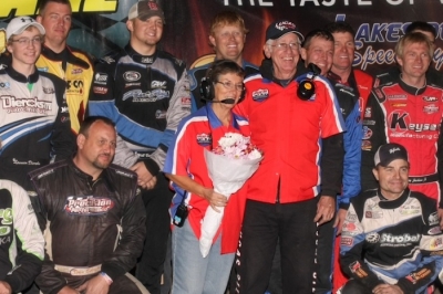 Drivers honor Harriett and Cowboy Chancellor at Lakeside Speedway. (cbracephotos.com)