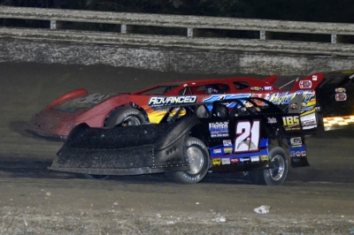 Winner Ivedent Lloyd Jr. (21) makes a low-side move. (Troy Bregy)