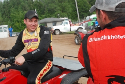 Chris Simpson (left) talks with Brian Birkhofer last season at Cedar Lake Speedway. (DirtonDirt.com)
