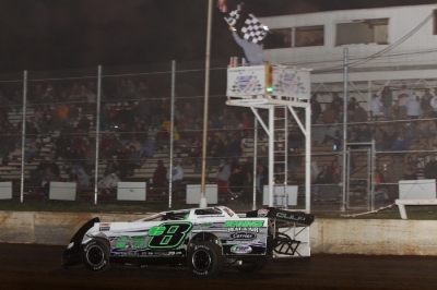 Timothy Culp takes the checkers at I-30 Speedway. (Woody Hampton)
