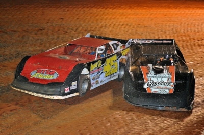 Winner Aaron Ridley (right) squeezes past the slower car of Doug Smith (45) at North Georgia. (dt52photos.com)