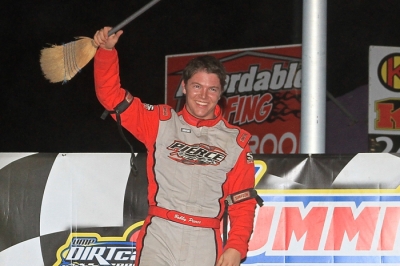 Bobby Pierce shows off the broom after completing a sweep at Tri-City. stlracingphotos.com)