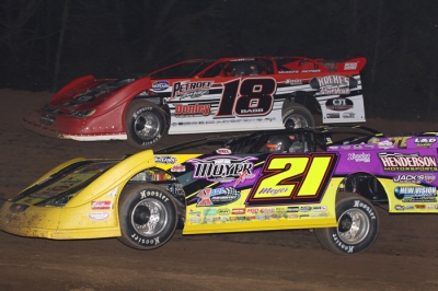 Billy Moyer (21) races with Shannon Babb en route to victory at I-30 Speedway. (Woody Hampton photo)