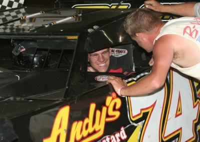 Payne is welcomed to victory lane. (Chris Bork)