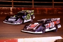Brandon Overton of Evans, Ga., (76) powers around the outside of Josh Putnam (212) and never looks back, leading all but one lap to win Saturday&#039;s $15,000 Bama Bash at Talladega Short Track. (zskphotography.com)