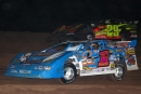 Chub Frank of Bear Lake, Pa., (1*) races by early leader Darrell Lanigan (29) and led the final 23 laps to win a $20,000 stop on the World of Outlaws Case Late Model Series at Sarver, Pa.&#039;s Lernerville Speedway on Aug. 12, 2005. (Paul Oyler)