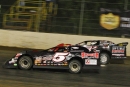 Mike Marlar (5B) makes the winning pass on Don O'Neal (71) on lap 92 for his $20,000 Clash at the Mag victory on the Lucas Oil Series. (Heath Lawson)