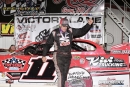 Pat Doar celebrates his third consecutive WISSOTA Challenge Series victory and the 39th of his career on Friday at Fiesta City Speedway. (Alex Ostenson)