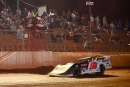 Sam Seawright of Rainsville, Ala., flashes under the checkers to win Friday&#039;s $10,000 Hunt the Front Super Dirt Series debut at Ultimate Motorsports Park in Elkin, N.C. (Kevin Ritchie)