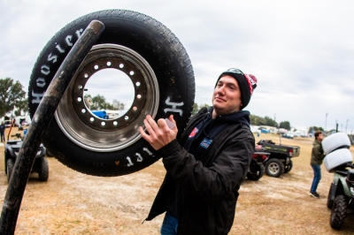 Wylie Moran sorts tires during Speedweeks. (heathlawsonphotos.com)