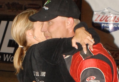 Girlfriend Tiffany Miller hugs Dale McDowell in victory lane. (erikgrigsbyphotos.com)