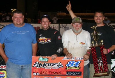 Car owner Steve Rushin (left) joins Eric Turner in victory lane. (Ron Mitchell)