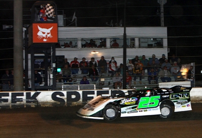 Chad Simpson takes the checkered flag. (mikerueferphotos.photoreflect.com)