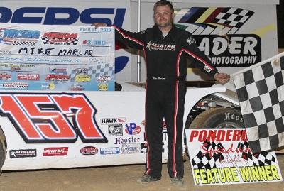 Mike Marlar has his hands full in victory lane. (Derrick Strader)