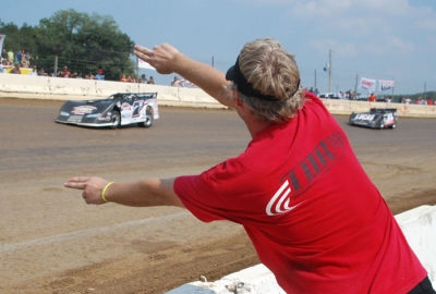 Jared Landers gets signals from the infield. (DirtonDirt.com)
