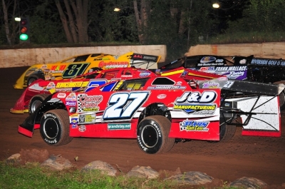 Jake Redetzke (27) heads for the front in his heat race at Red Cedar. (chrisburback.com)