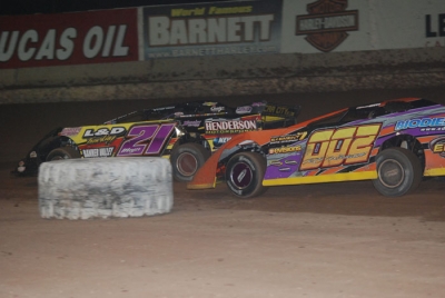 Runner-up R.C. Whitwell (002) chases Billy Moyer (21) on the last lap. (DirtonDirt.com)