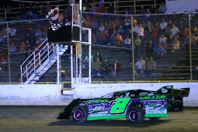 Timothy Culp takes the checkers for his first Late Model victory. (Best Photography)