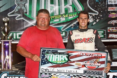 Car owner Steve Rushin (left) joins R.C. Whitwell in victory lane. (Ron Mitchell)