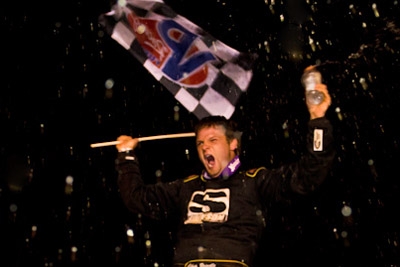 Chip Brindle sprayed sport drink in victory lane at Cherokee Speedway. (Gary Laster)