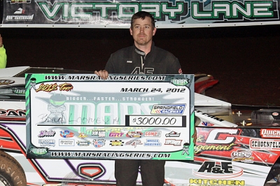 Brad Looney shows off his $3,000 winner's check at Springfield. (Ron Mitchell)