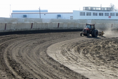 Keith Simmons works the Farley Speedway surface during the off-season. (Paul Misner)
