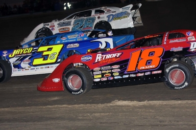 Jimmy Mars (28) launches into the lead from outside the front row. (Jim DenHamer)