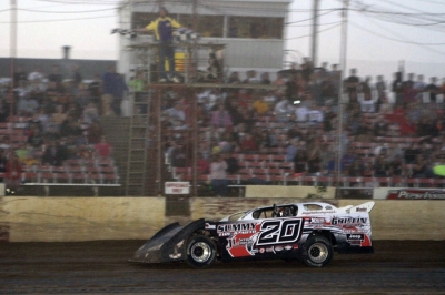 Dustin Griffin takes the checkers at Quincy (Ill.) Raceway. (stlracingphotos.com)