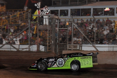 Scott Bloomquist takes the checkers for his $30,000 payday. (Jason Shank)