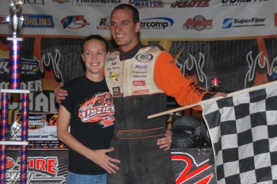 Ryan and Michelle Unzicker celebrate his first career $10,000 victory. (DirtonDirt.com)