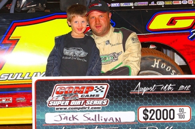 Jack Sullivan celebrates with son Jace after his Comp Cams Series victory. (Woody Hampton)